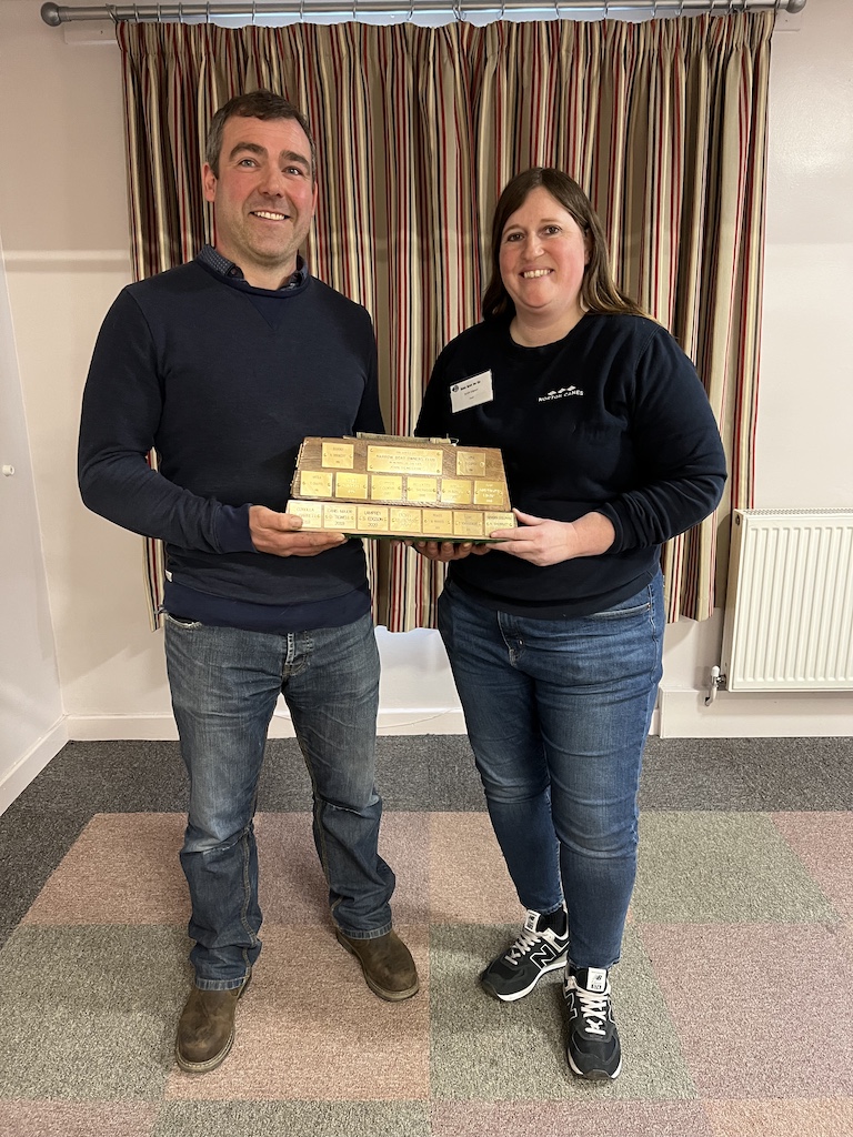 Nick Sherratt receives the trophy from HNBC Chair Sarah Edgson